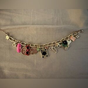 Kate Spade Gold Charm Bracelet with Pink and Black Details